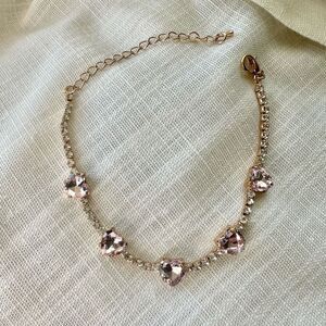 Rhinestone tennis bracelet with light pink hearts